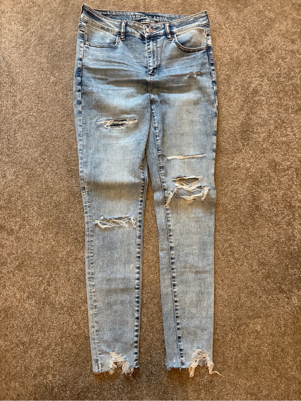 American Eagle Outfitters Light Blue Distressed hi-rise jegging 10 long raw hem